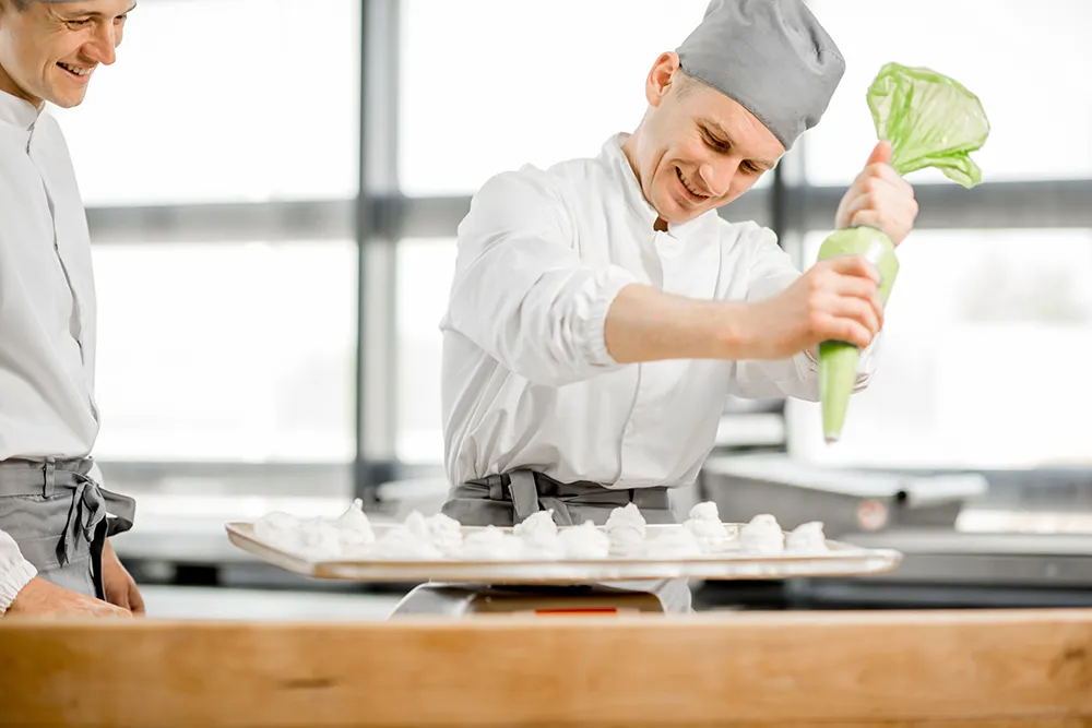 Culinary student practicing piping 